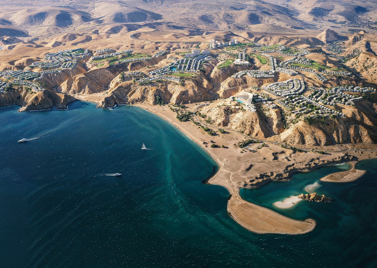 Aerial view of AIDA on the clifftops above Muscat Bay and the coastline