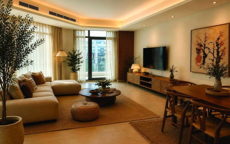 Living room in a refurbished Al Rawdah apartment